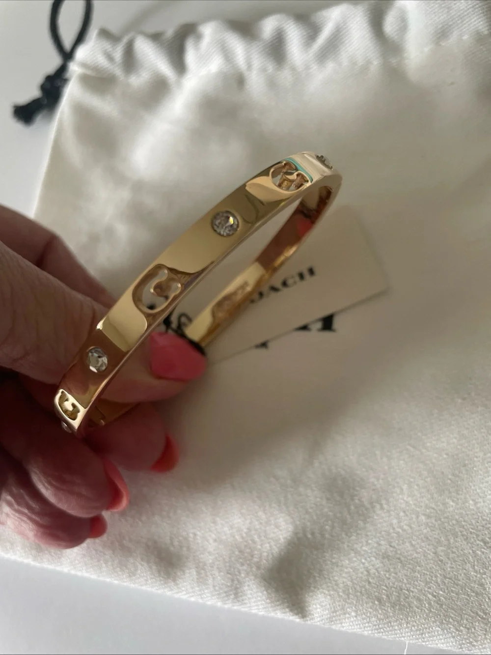 Coach  Gold Tone with crystals Slim Hinged Bangle